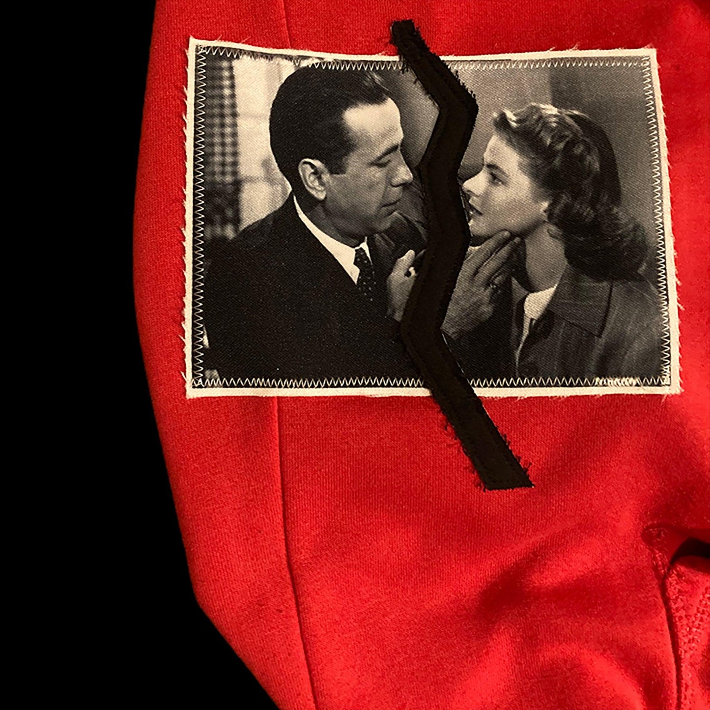 Detail of the Casablanca patch on the Love is not real hoodie upcycled by 00timeleft.