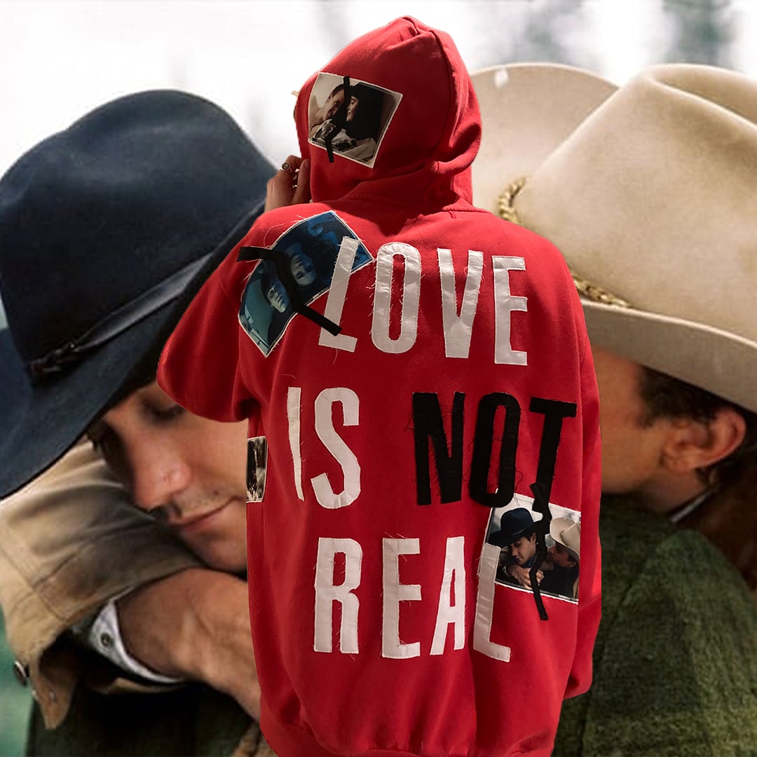 Back view of the Love is Not Real Hoodie worn by a model