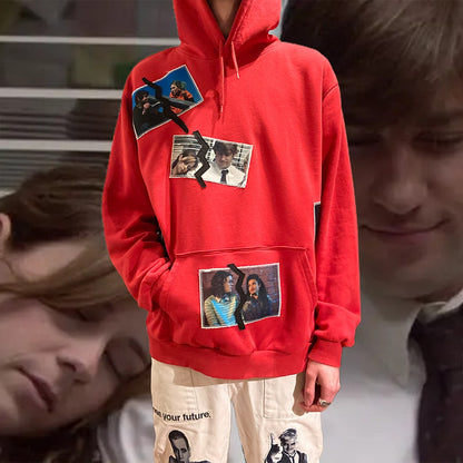 Front view of the Love is Not Real Hoodie worn by a model