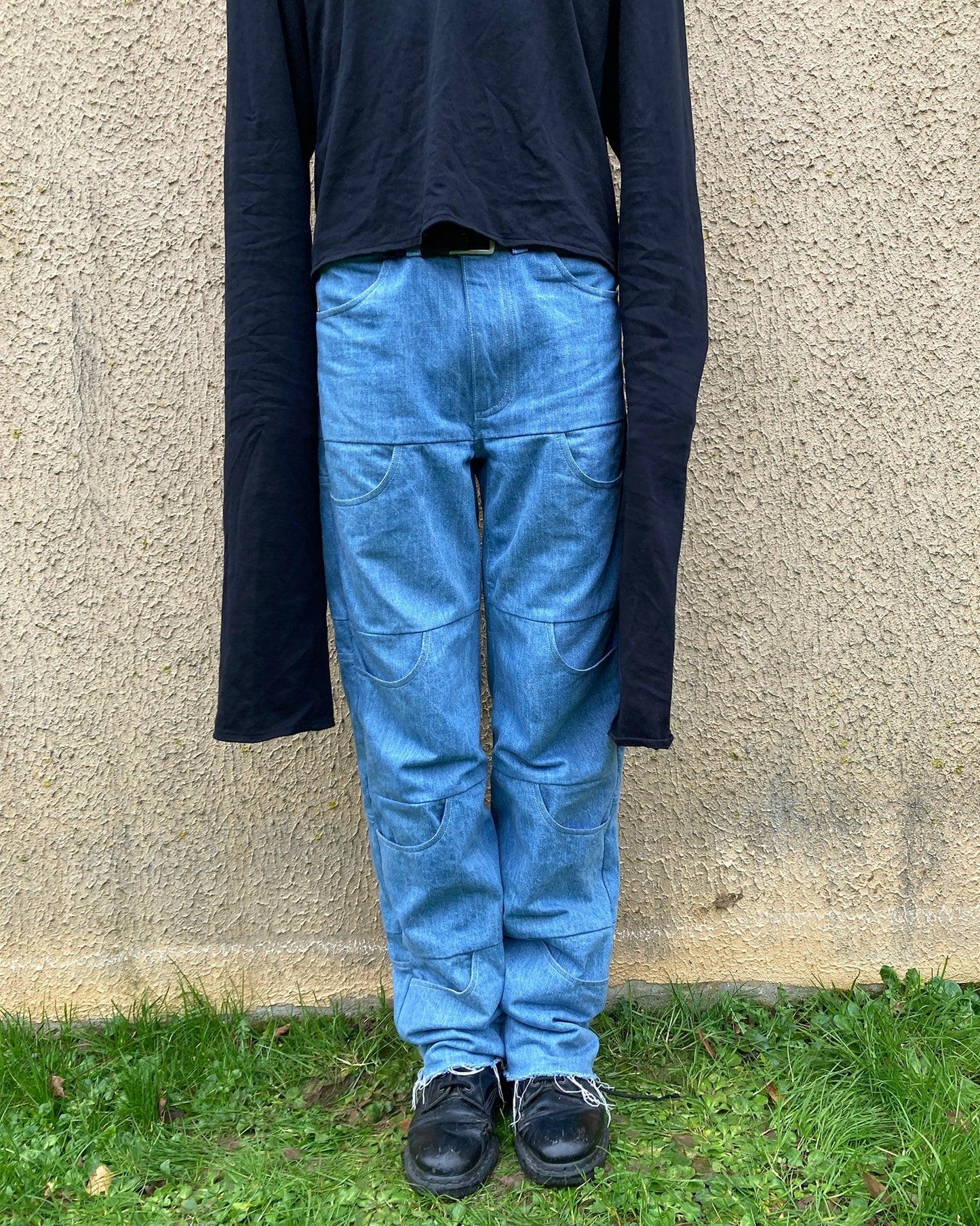 The front of the Unlimited Space Jeans featuring 10 front pockets