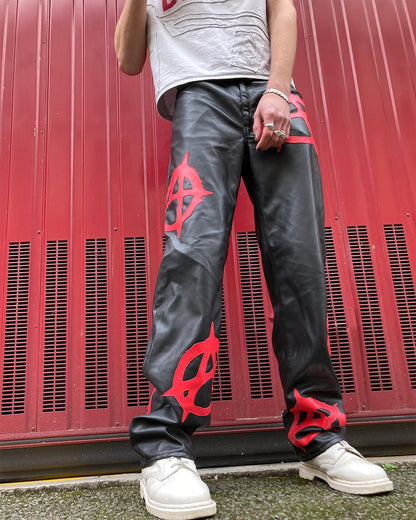 front of the anarchy pleather pants worn by a model