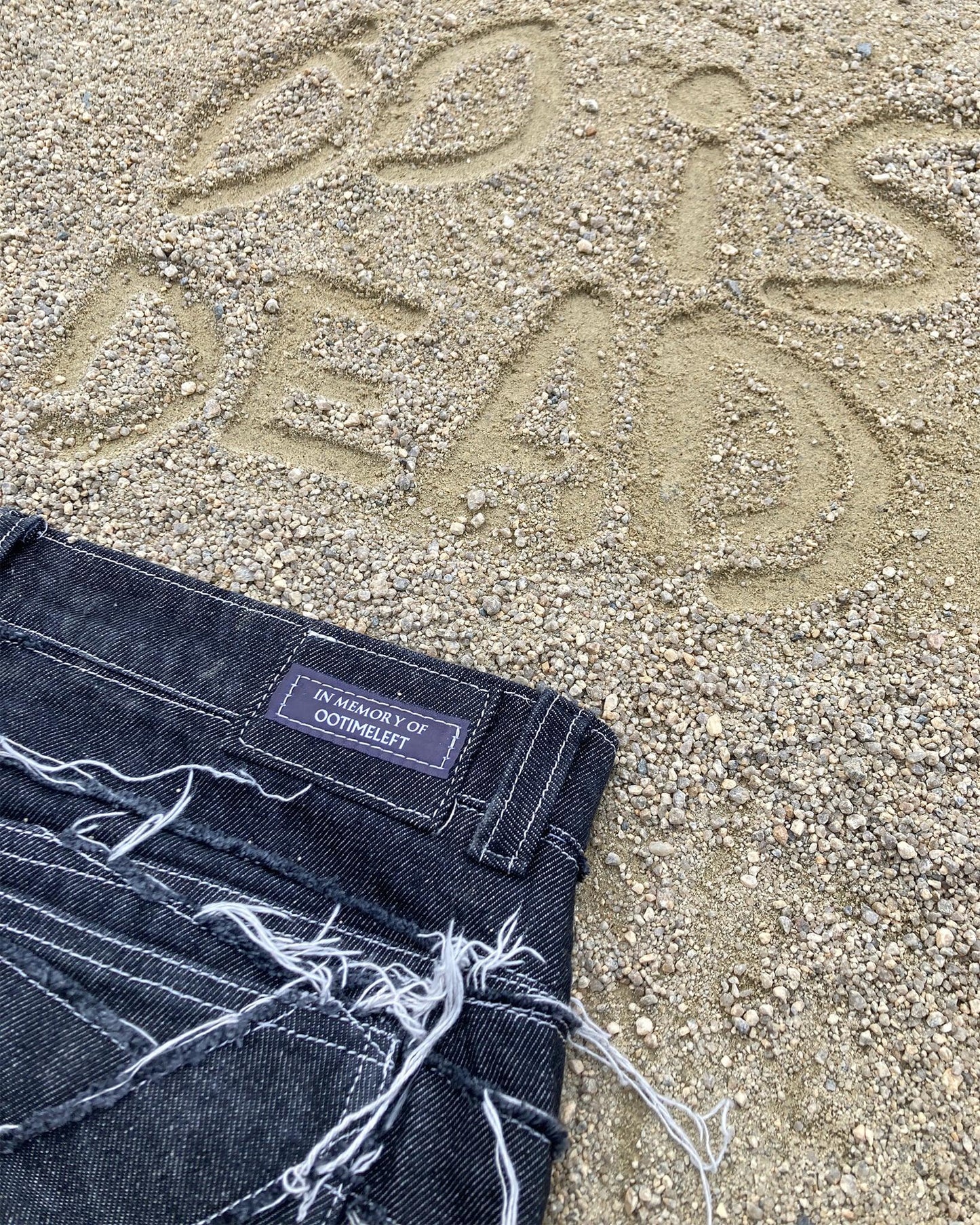 Back patch of the Cobweb jeans 