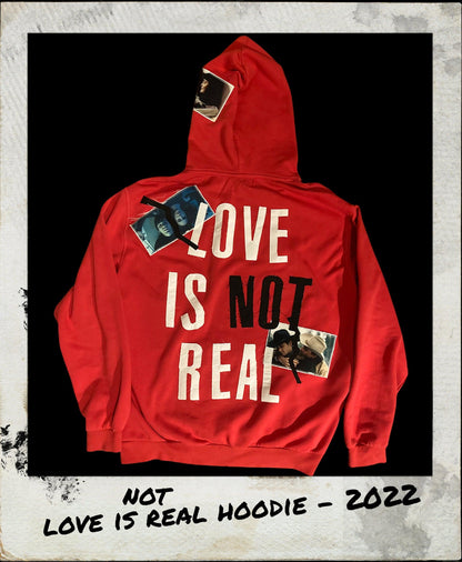 LOVE IS NOT REAL HOODIE